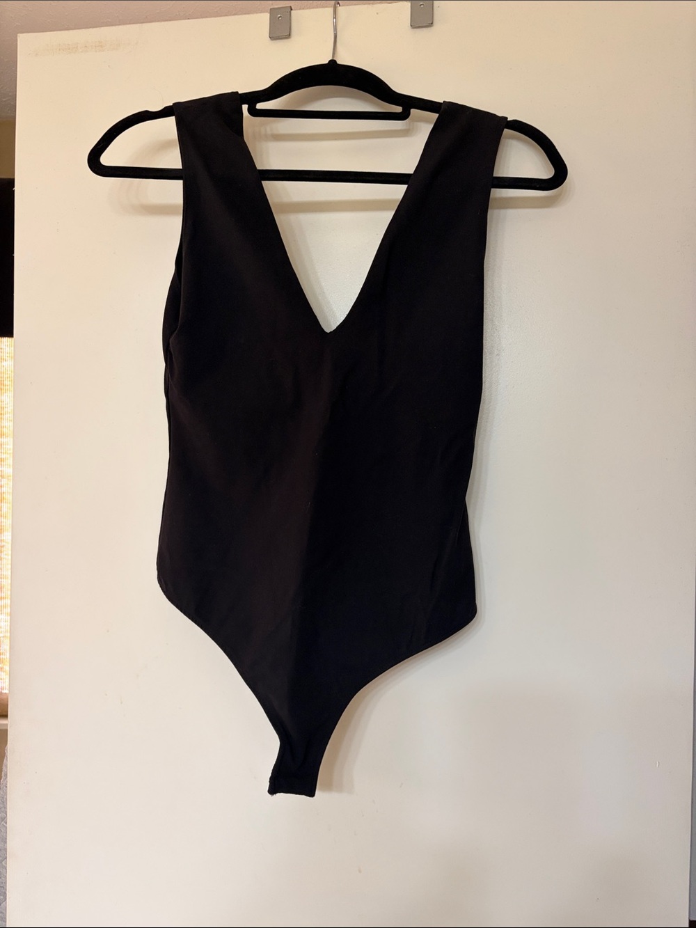Free people Black V-Neck One-Piece Bodysuit